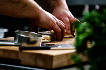 Fototapeta na wymiar chef preparing food in the kitchen