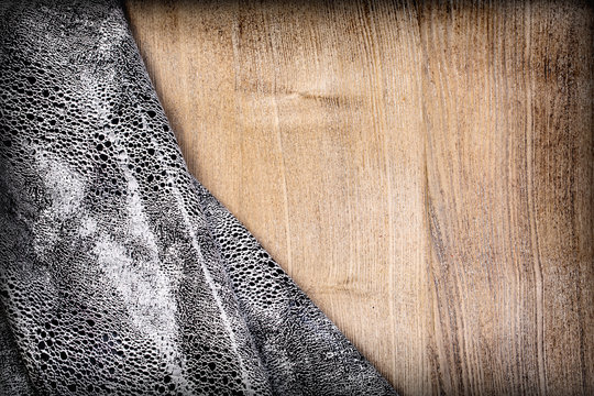eather on wooden background