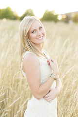 gorgeous young woman in field