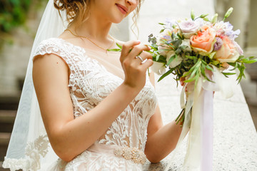 Beautiful blonde princess bride posing near old medieval castle © Angelov