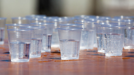Plastic cups filled with water