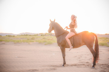 Arabian horse, a girl, and the desert