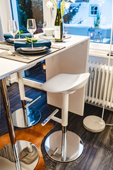 Beautiful modern interior design. Apartment inside view. Modern chair in the living room.