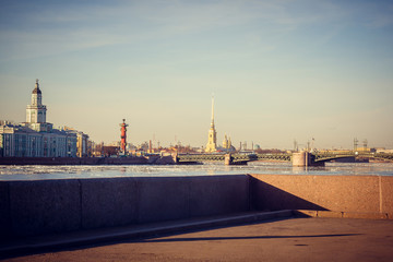Fototapeta premium Neva spring at sunset. Center of St. Petersburg in the spring at sunset. Walk through the historic center of St. Petersburg. Spring sunset.