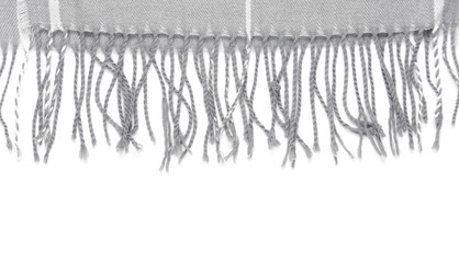 Part of a beautiful gray scarf in a cage isolated on a white background with an area for text.