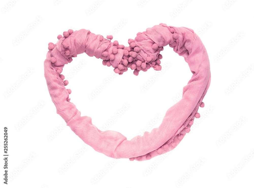 Poster frame in the shape of a heart of twisted delicate fabric of pink color isolated on white background