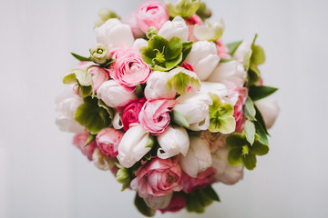 Wedding bouquet from top view on white background