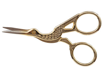 Scissors with curly handles in the shape of a bird, with clipping path, isolated on white background