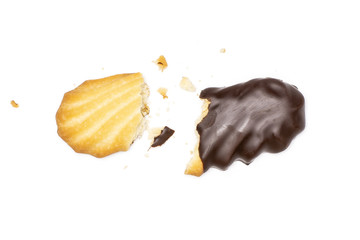 Group of two halves of cracked lazy cookie with chocolate flatlay isolated on white background