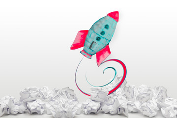 Innovation and problem solving idea of rocket flying from paper