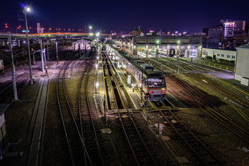 A train waiting to go to Osaka at night