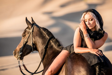 Fototapeta premium Desert Model and Her Horse