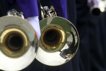 Marching band musicians performing.