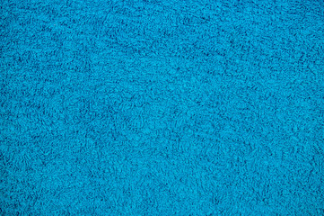 Fototapeta na wymiar blue fabric terry cloth towel texture. background, bedroom.