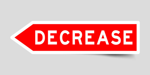 Label sticker in red color arrow shape as word decrease on white background