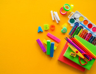 Stationery yellow background. Education. Training material for learning and creativity.