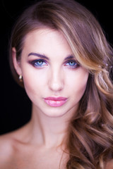 Fototapeta premium Closeup portrait of beautiful model with long blond hair