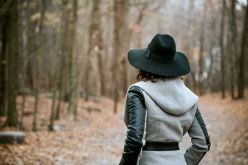 Lonely Girl Walking In Empty Autumnal Woods