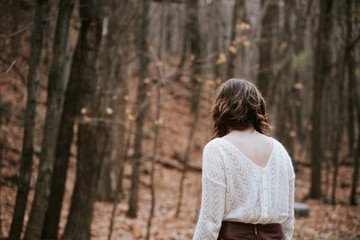 Lonely Girl Walking In Empty Autumnal Woods