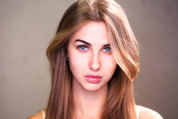 Naklejka premium Portrait of a young beautiful blonde woman
