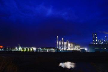 Modern factory at night