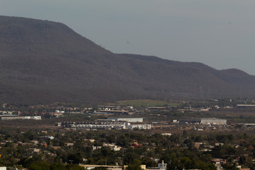 Mountain with antennas and dry trees located in the southern part of Culiacan, Sinaloa, Mexico.