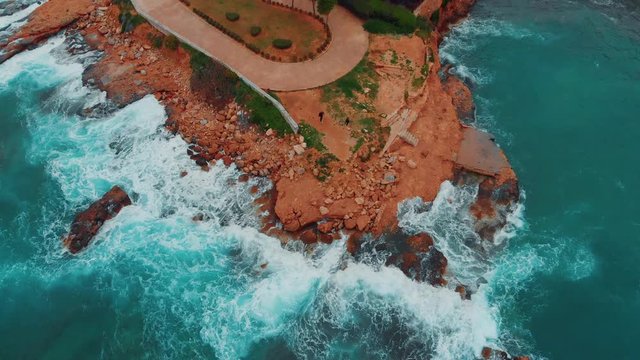 Aerial drone view video of sea near beach with birds fly, Attica, Greece