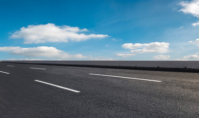 Fototapeta premium Road surface and sky cloud landscape..