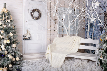 New Year's photo studio decorated in white colors
