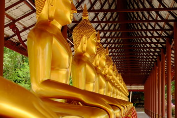 golden Buddha statues in the temple of Thailand, in Thai style.Old buddha statue