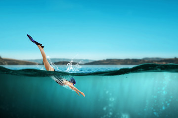 Fototapeta na wymiar Swimmer in flippers. Mixed media