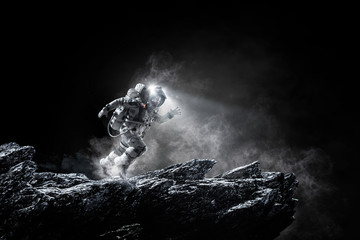 Spaceman running fast. Mixed media