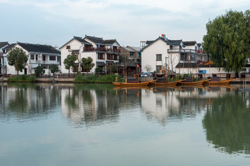 Fototapeta na wymiar The sailboat on the Zhouzhuang Ancient Town