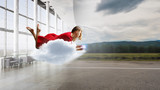 Woman fly in air and use mobile. Mixed media