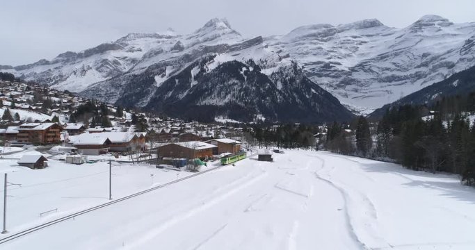 Train arriving in les Diablerets - Aerial 4K