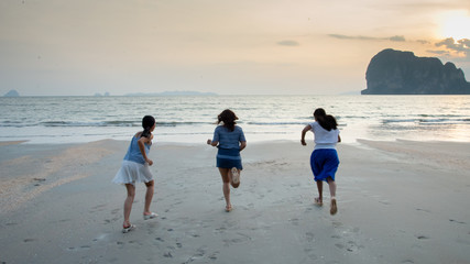 children playing on the beach