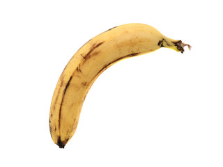 One yellow very ripe banana isolated on white background close up
