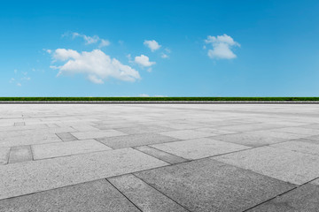 Fototapeta premium Empty square tiles and beautiful sky scenery
