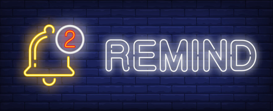 Remind neon text with golden bell sign