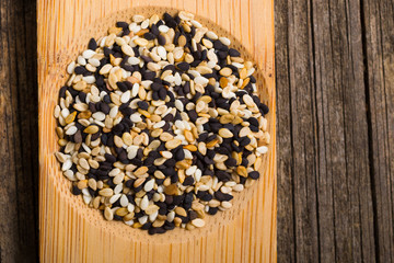 sesame seeds, old wooden table