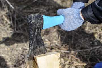 Chopping wood with an ax