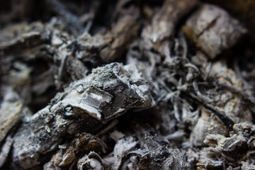 Pile of ashes from burn the wood in the stove. background and grunge texture