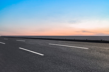 Fototapeta premium Road surface and sky cloud landscape..