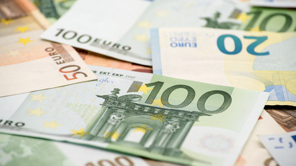 Obraz na płótnie Canvas Euros bills of different values. Euro bill of one hundred