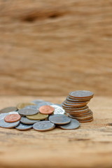 The concept of saving money on the old wooden floor.