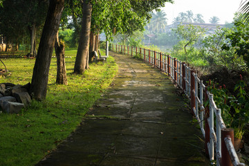 green path at river side