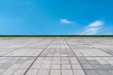 Fototapeta premium Empty square tiles and beautiful sky scenery