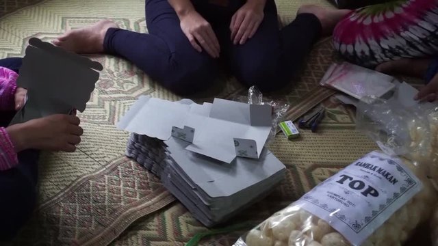 Women packing snacks