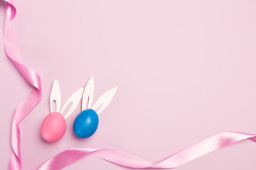 easter eggs on pink background