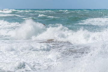 Waves Crashing on Rocks on the Southern Italian Mediterranean Coast